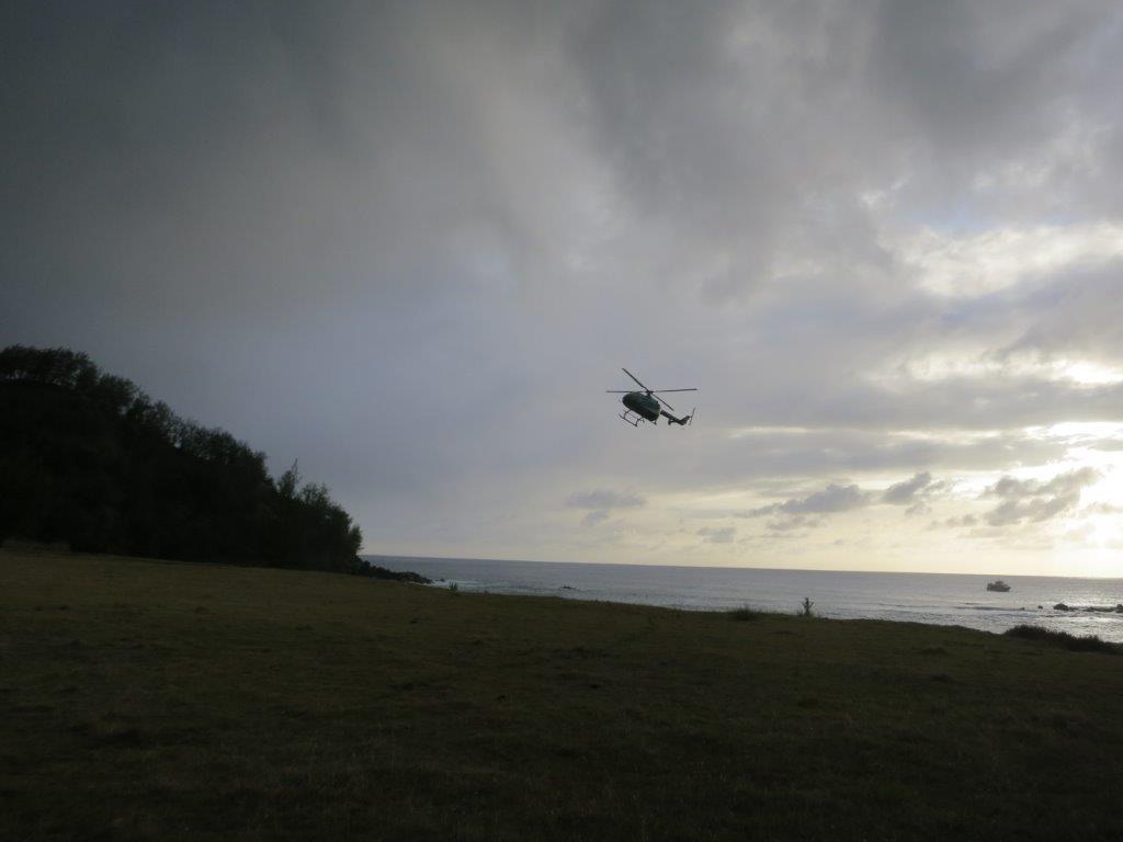 Helicopter approaches. It's about a 2 hour flight from Saipan
